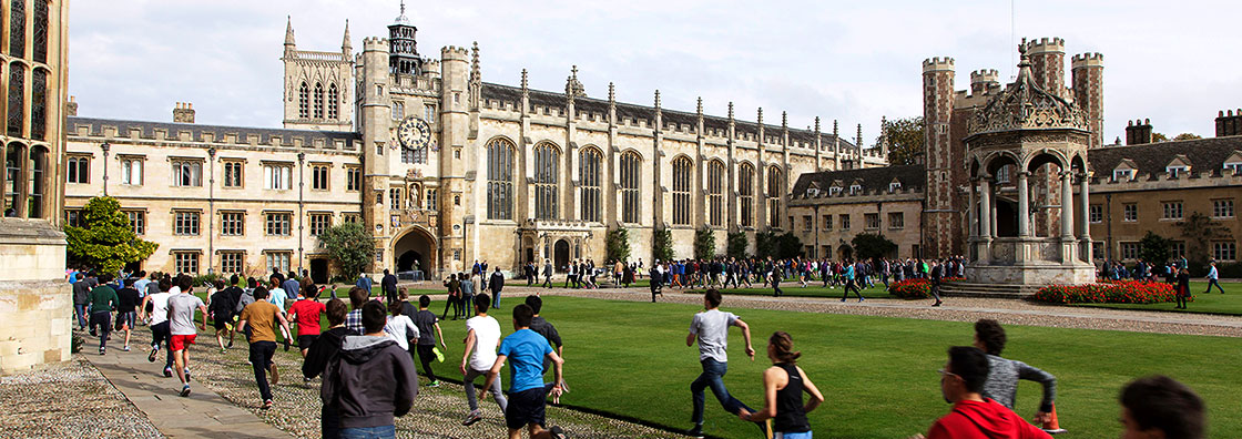 Students running around campus